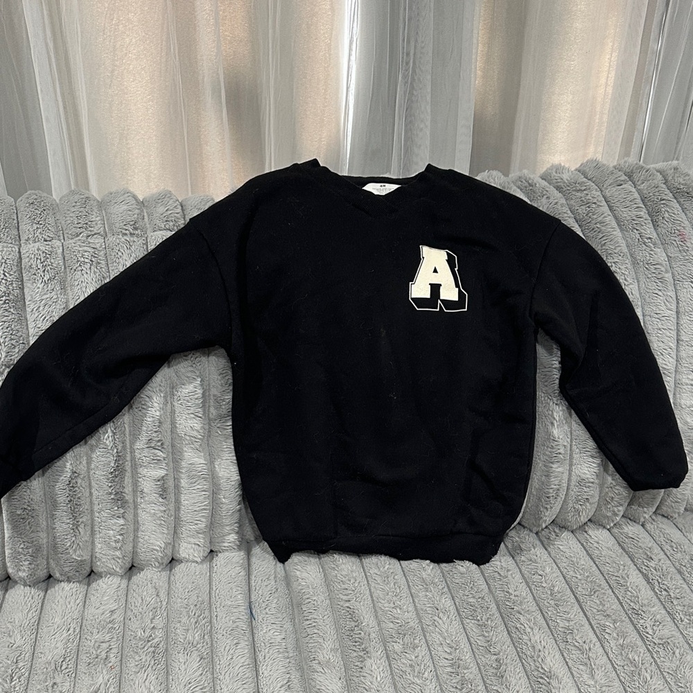 H&M Black V-Neck Sweater with Cream Letter Patch